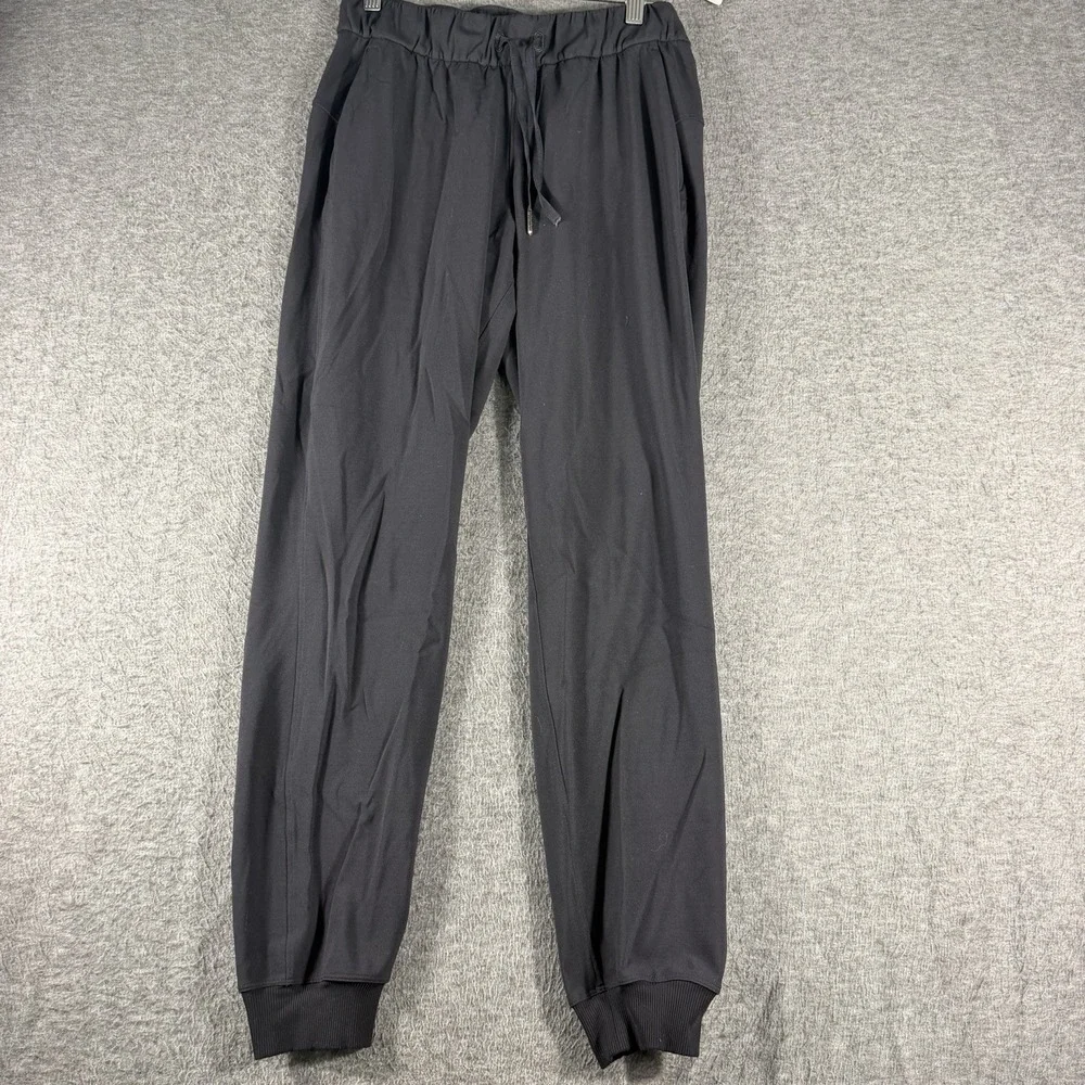 Lululemon On The Fly Jogger Women's Sz. 4 Black Performance Gym Athleisure